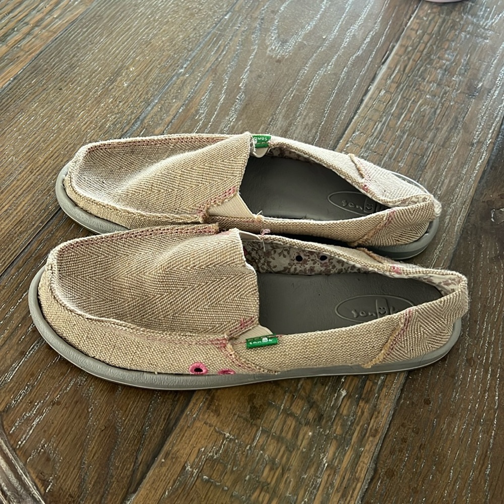 Sanuk slip on shoes in tan.